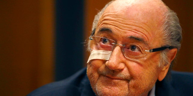 Suspended FIFA President Sepp Blatter attends a news conference in Zurich, Switzerland, Monday, Dec. 21, 2015 after he has been banned for 8 years from all football related activities. (AP Photo/Matthias Schrader)