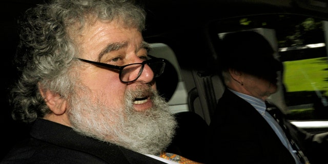 FILE - In this May 29, 2011 file photo FIFA official Chuck Blazer leaves the FIFA headquarters in Zurich, Switzerland. As it was announced Thursday, July 9, 2015 FIFA's ethics committee has expelled former executive committee member Blazer from football for bribery and other corruption. (Steffen Schmidt/Keystone via AP, File)