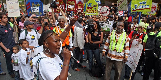 September 30: Protestors from the Boston Workers Alliance march in front of a Bank of America office.