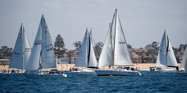 April 27, 2012: Boats tack for position before the start of the Newport Ocean Sailing Association's Newport to Ensenada yacht race.
