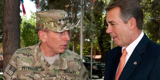 April 19: In this photo provided by ISAF Headquarters, U.S. Army Gen. David H. Petraeus, commander of NATO and International Security Assistance Force troops in Afghanistan, left, talks with House Speaker John Boehner of Ohio during a congressional delegation visit in Kabul, Afghanistan.