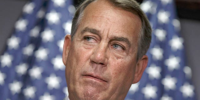 House Speaker John Boehner of Ohio meets with reporters on Capitol Hill in Washington, Tuesday, June 24, 2014.