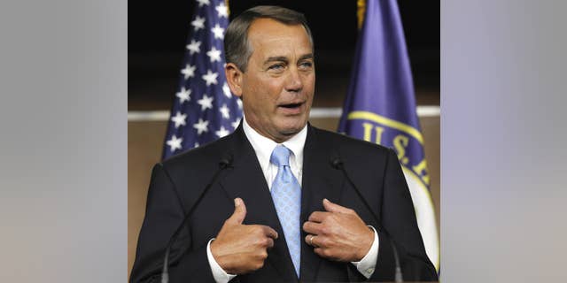 House Speaker John Boehner of Ohio gestures during a news conference on Capitol Hill in Washington, Wednesday, March 2, 2011. (AP Photo/Alex Brandon)