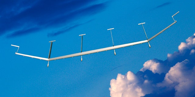 Boeing's SolarEagle spyplane in flight in the clouds, shown in an artist's rendering.