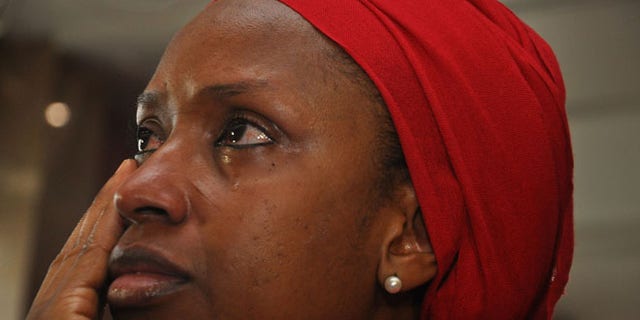 July 8: An unidentified mother of a child that was abducted by Nigerian extremists reacts during an event in the memory of the girls.