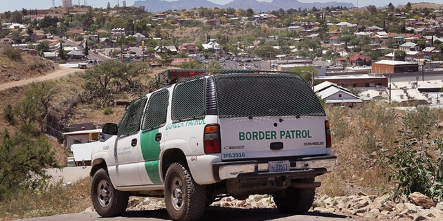 NOGALES, AZ - JUNE 01: A Border Patrol agent patrols the border June 1, 2010 in Nogales, Arizona. During the 2009 fiscal year 540,865 undocumented immigrants were apprehended entering the United States illegally along the Mexican border, 241,000 of those were captured along this 262 mile stretch of the border known as the Tucson Sector. (Photo by Scott Olson/Getty Images)