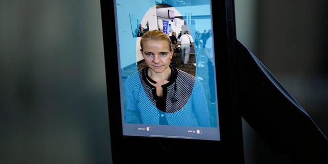 The system takes a picture of the person and runs it through a database to compare with visa and passport pictures of people scheduled to fly that day.