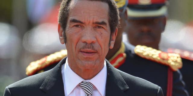 FILE - In this Tuesday, Oct. 28 2014, President of Botswana Ian Khama attends a swearing-in ceremony for a second and final term as Botswana president at the National Assembly buildings in Gaborone, Botswana. Opposition parties in Botswana say the president is undermining the role of parliament after he challenged the process of electing a vice president. (AP Photo)