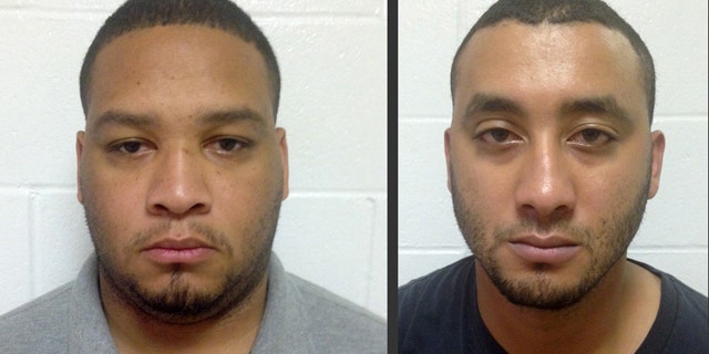 FILE - These undated file booking photos provided by the Louisiana State Police shows Marksville City Marshal Derrick Stafford, left, and Marksville City Marshal Norris Greenhouse Jr. (Louisiana State Police via AP, File)