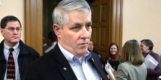 FILE - In this March 20, 2015 file photo, Kansas State Rep. John Bradford, R-Lansing, appears at the Statehouse in Topika, Kan. Bradford said Thursday, Jan. 7, 2016, that he regrets his recent sharing on Facebook of a posting that mocks English spoken with a Hispanic accent to make a crude comment about President Barack Obama, which critics saw as racist. Bradford says sharing the post was in bad taste. (Thad Allton/Topeka Capital-Journal via AP, File)