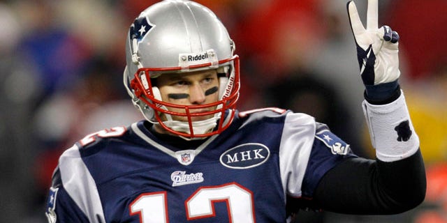 New England Patriots quarterback Tom Brady signals to his bench during the second half of an NFL divisional playoff football game against the Denver Broncos Saturday, Jan. 14, 2012, in Foxborough, Mass. (AP Photo/Elise Amendola)