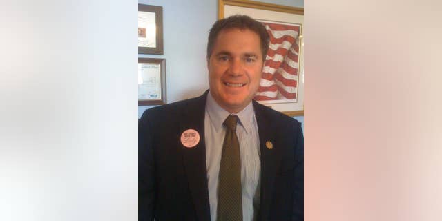 Rep. Bruce Braley, D-Iowa, wears one a button supporting Rep. Debbie Wasserman Schultz in this photo posted to his Twitter account.  (Rep. Burce Braley Photo)