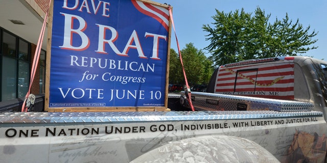 FILE: June 11, 2014: A truck driven by a supporter for Tea Party candidate Dave Brat's campaign in front of his headquarters in Glen Allen, Va.