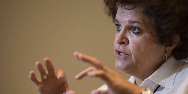 Brazil's Environment Minister Izabella Teixeira speaks during an interview in Rio de Janeiro, Brazil, Wednesday, Nov. 5, 2014. Teixeira says her nation will assume a protagonist role at a climate change conference in Peru, and will hold developed nations accountable for commitments to reduce carbon emissions. (AP Photo/Felipe Dana)