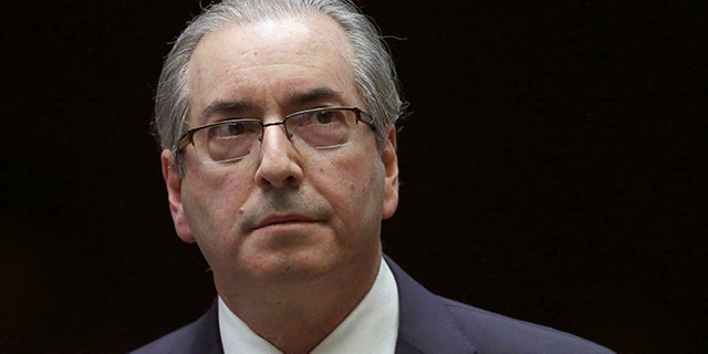 FILE - In this Sept. 12, 2016 file photo, Brazil's former President of the Chamber of Deputies Eduardo Cunha takes a break during the presentation of his defense in the Chamber of Deputies, in Brasilia, Brazil. The man who led efforts to impeach former President Dilma Rousseff was arrested on Wednesday, Oct. 19, 2016 in Brazilâs sprawling corruption probe at state-run oil giant Petrobras. The arrest made in the capital of Brasilia was confirmed by the office of Judge Sergio Moro, who chairs many investigations of the scandal. (AP Photo/Eraldo Peres, File)