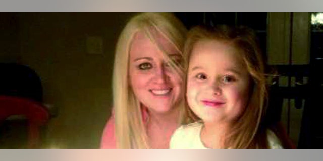 This March 2013 family photo provided by Lindsey DeFilipi shows Shauna Hadden, left, and her daughter Ava Machado, both of Agawam, Mass. Hadden, a Massachusetts mom says she and her 6-year-old daughter are stranded in Brazil after police seized their passports because of a custody battle with the childâs father. (AP Photo/Family Photo)