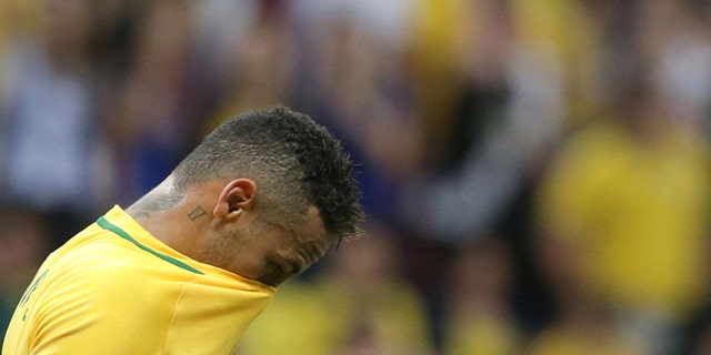 Brazil's Neymar reacts at the end of a group A match of the men's Olympic football tournament between Brazil and Iraq at the National Stadium in Brasilia, Brazil, Sunday, Aug. 7, 2016. The game ended in a 0-0 draw. (AP Photo/Eraldo Peres)