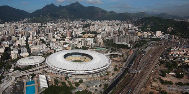 Aerial view shows the new rooftop of the Maracana Stadium, which is undergoing renovations in preparation for the 2013 Confederations Cup and 2014 World Cup in Rio de Janeiro, Brazil, Thursday, April 11, 2013. (AP Photo/Felipe Dana)