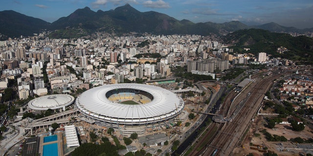 Aerial view shows the new rooftop of the Maracana Stadium, which is undergoing renovations in preparation for the 2013 Confederations Cup and 2014 World Cup in Rio de Janeiro, Brazil, Thursday, April 11, 2013. (AP Photo/Felipe Dana)