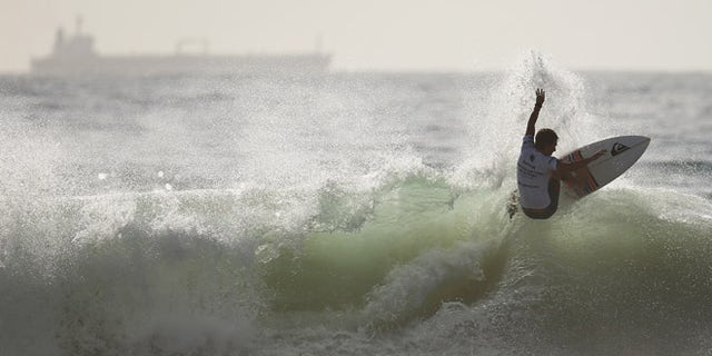 SYDNEY, AUSTRALIA - FEBRUARY 14: Jesse Mendes of Brazil competes during the Australian Open of Surfing at Manly Beach on February 14, 2015 in Sydney, Australia. (Photo by Cameron Spencer/Getty Images)