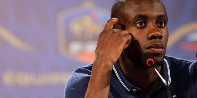 France's player Blaise Matuidi gestures as he answers questions during a press conference in Ribeirao Preto, Brazil, Friday, June 13, 2014. France is in group E at the World Cup soccer tournament and plays its first match Sunday. (AP Photo/David Vincent)