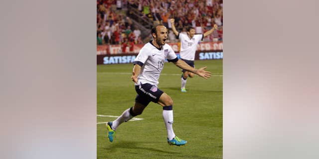 FILE - In this Sept. 10, 2013, file photo, United States' Landon Donovan celebrates after scoring a goal against Mexico during the second half of a World Cup qualifying soccer match in Columbus, Ohio. Donovan hasn't just resurrected his career with the U.S. team, he may be the Americans' most important player. (AP Photo/Jay LaPrete, File) - YOU CAN FIND THE ENTIRE WORLD CUP COLLECTION ON APIMAGES.COM
