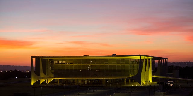 FILE - In this May 12, 2016, file photo, Planalto presidential palace during sunrise in Brasilia, Brazil, after the Senate voted to suspend President Dilma Rousseff pending an impeachment trial. For the sake of the nationâs 200 million people, and for all the South American nations whose fortunes are tied to Brazilâs powerhouse economy, one hopes that her vice president, now acting President, Michel Temer know what to do. (AP Photo/Felipe Dana)
