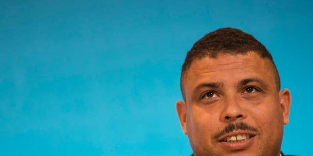 Ronaldo, Brazil's former soccer player and a member of the local organizing committee for the 2014 World Cup, talks during a news conference at the Maracana stadium in Rio de Janeiro, Brazil, Thursday, March 27, 2014. (AP Photo/Felipe Dana)