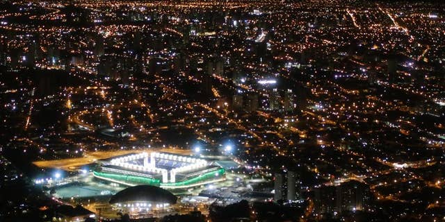 FILE - In this June 24, 2014 file photo, a night aerial view of the Arena Pantanal stadium in Cuiaba, Brazil. The new stadium in the western Brazilian city is being closed for "emergency repairs" just seven months after it held four World Cup matches. (AP Photo/Felipe Dana, File)