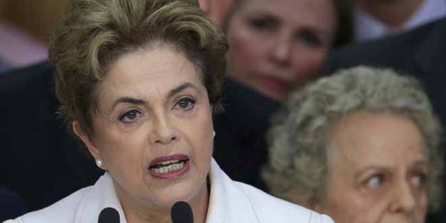 Brazil's President Dilma Rousseff addresses the nation at Planalto presidential palace in Brasilia, Brazil, Thursday, May 12, 2016.
