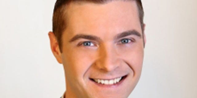Brett Cummins, 33, is seen in a photo on the website of Little Rock station KARK-TV. Cummins works as a meteorologist for the station.
