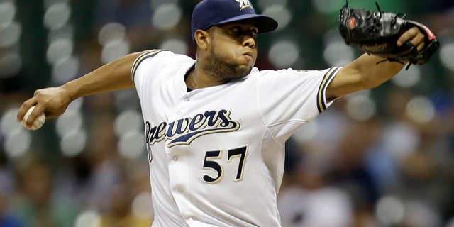 MILWAUKEE, WI - JULY 18: Francisco Rodriguez #57 of the Milwaukee Brewers pitches in the top of the ninth inning against the Miami Marlins at Miller Park on July 18, 2013 in Milwaukee, Wisconsin. (Photo by Mike McGinnis/Getty Images)