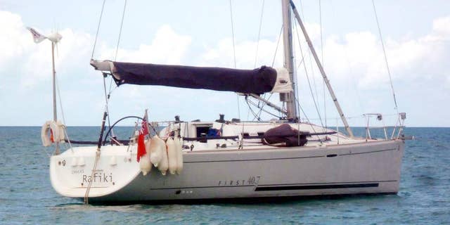 This is a undated handout file photo issued by the Royal Yachting Association, via the PA, on Monday May 19, 2014   show the  missing yacht Cheeki Rafiki .  The families of four missing British yachtsmen are imploring the U.S. Coast Guard to resume the search for the men, whose boat capsized in the mid-Atlantic.  The Cheeki Rafiki was returning from a regatta in Antigua when it ran into trouble about 1,000 kilometers (620 miles) east of Cape Cod, Massachusetts, on Thursday. The 40-foot high performance Beneteau yacht diverted to the Azores, but contact was lost on Friday. (AP Photo/Royal Yachting Association/PA) UNITED KINGDOM OUT NO SALES NO ARCHIVE