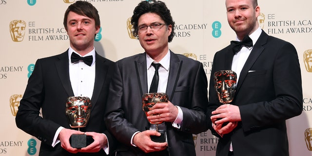 From left, Brian J. Falconer, Ronan Blaney and Michael Lennox, winners of the Best Short film, Boogaloo and Graham, pose for photographers in the winners room, during the British Academy Film and Television Awards 2015, at the Royal Opera House, in London, Sunday, Feb. 8, 2015. (Photo by Jonathan Short/Invision/AP)