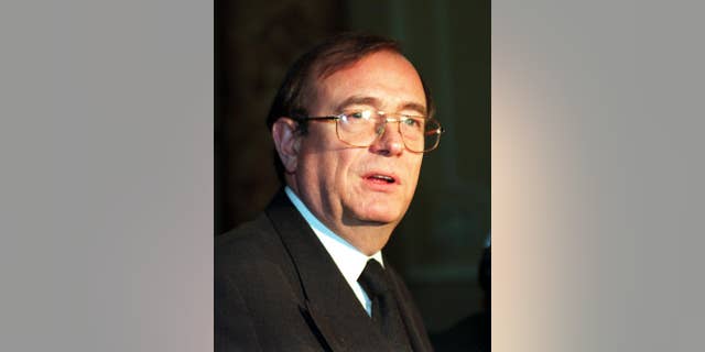 FILE - This Tuesday, Dec. 16, 1997 file photo shows the deputy speaker of the Houe of Lords John Sewel. Sewel has resigned his position after publication of photos and a video allegedly showing him using cocaine with prostitutes. Lords Speaker Baroness D'Souza Sunday called John Sewel's alleged behavior "shocking and unacceptable" and said she is calling in police to investigate on an urgent basis. The Sun on Sunday newspaper on Sunday, July 26, 2015 published photographs of him naked and appearing to snort cocaine along with snippets of his conversations with women said to be prostitutes. (Suzanne Hubbard/PA via AP, file) UNITED KINGDOM OUT - NO SALES - NO ARCHIVES