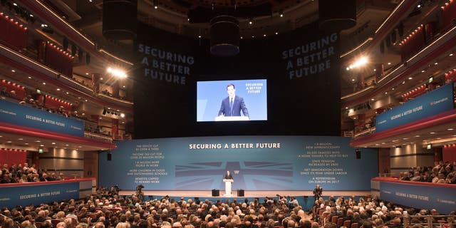 Sept. 29, 2014 - Britain's economic cabinet minister, Chancellor of the Exchequer, George Osborne, speaks at the annual Conservative Party conference in Birmingham, England. Britain's governing Conservatives were struggling to focus attention on their economic policies after a government minister sent an explicit photo to a tabloid journalist posing on Twitter as a young party supporter.