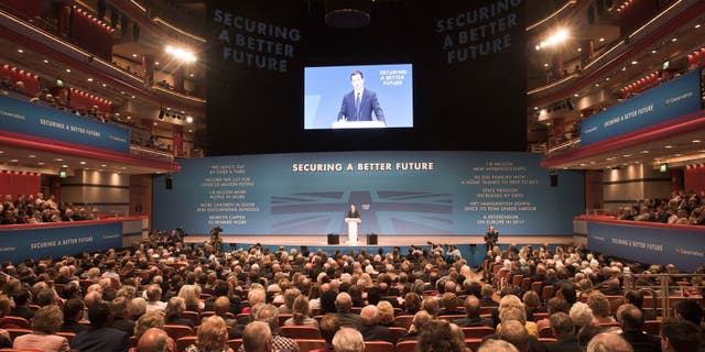 Sept. 29, 2014 - Britain's economic cabinet minister, Chancellor of the Exchequer, George Osborne, speaks at the annual Conservative Party conference in Birmingham, England. Britain's governing Conservatives were struggling to focus attention on their economic policies after a government minister sent an explicit photo to a tabloid journalist posing on Twitter as a young party supporter.