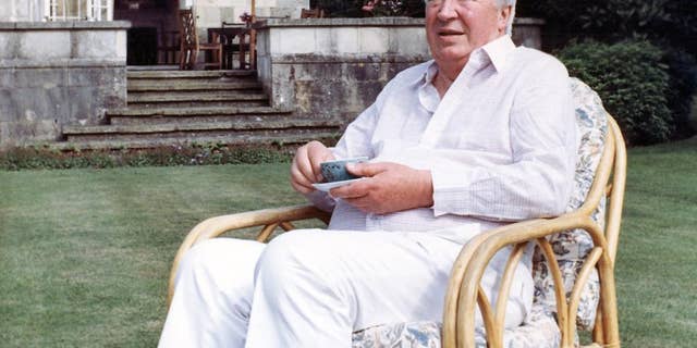 July 19, 1989 - FILE photo of former British Prime Minister Edward Heath in the garden of his home in Salisbury, England. Britain's police watchdog said it will investigate whether police failed to pursue an allegation of child sexual abuse against the late Prime Minister in the 1990s.