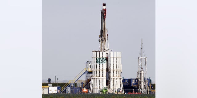 Nov. 2, 2011: Protestors scale a shale gas rig at Banks, near Southport, England bringing a halt to work at the Cuadrilla Resources site.