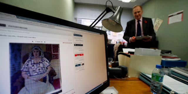 Nov. 6, 2013 - A picture on a news website, showing a painting by Henry Matisse entitled "Sitzende Frau," or "Sitting Woman," which is part of art recently found in Munich, Germany. Researchers of the Art Loss Register continue their work in central London, after German authorities discovered more than 1,400 artworks, some by modern masters such as Marc Chagall, Henri Matisse and Pablo Picasso, stacked in a Munich apartment.