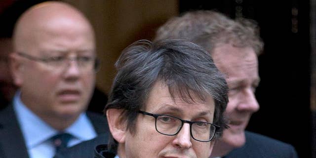 FILE - This Dec. 4, 2012 file photo shows Guardian newspaper editor Alan Rusbridger in London. Rusbridger the editor-in-chief of The Guardian newspaper said Wednesday Dec. 10, 2014, he will step down after 20 years in the role.  Rusbridger said he would take over as chairman of The Scott Trust, which owns Guardian Media Group and was created to safeguard its journalistic freedom. Rusbridger’s leadership saw the paper expand from a Britain-only newspaper to an international media organization with a strong web presence. (AP Photo/Alastair Grant, File)