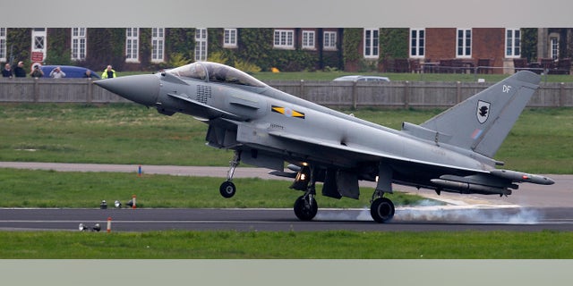 May 2, 2012: An RAF Typhoon fighter aircraft lands at RAF base Northolt, where four of the aircraft will be based as part of the Olympics related security exercise in west London.