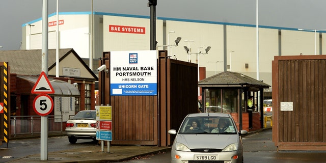 A general view of Unicorn Gate at HMS Nelson Portsmouth, England, Wednesday, Nov. 6, 2013, home to BAE Systems who are to axe jobs across its naval ships business and end shipbuilding at one of the country's most historic yards, in Portsmouth.