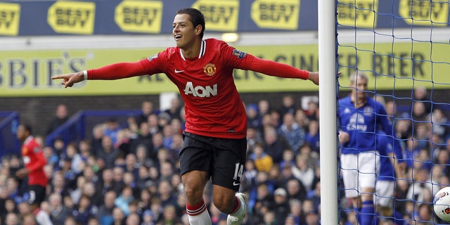 Manchester United's Javier Hernandez celebrates scoring against Everton during the English Premier League soccer match at Goodison Park, Liverpool, England, Saturday Oct. 29, 2011. Manchester United won the match 1-0. (AP Photo/PA, Peter Byrne) UNITED KINGDOM OUT