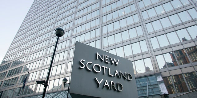 Dec. 20: A view of New Scotland Yard, the headquarters building of the Metropolitan Police, with its sign in London. On Dec. 20, British police arrested a dozen men suspected of plotting a large-scale terror attack.