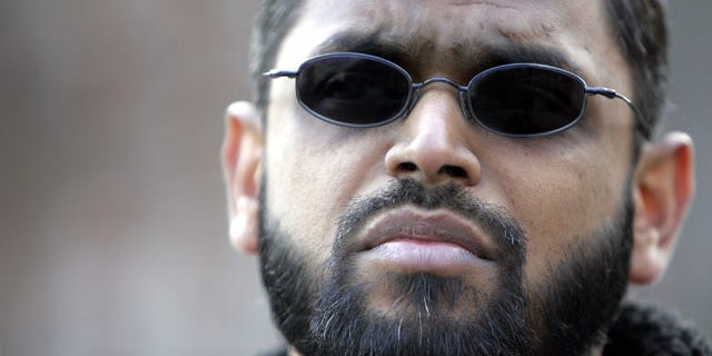 FILE - March 3, 2006: Moazzam Begg outside the United States Embassy in London. British police say Begg is one of four people arrested on suspicion of Syria-related terrorism offenses in the Birmingham area of central England. Police say 45-year-old Begg is suspected of attending a terrorist training camp and facilitating terrorism overseas. (AP Photo/Alastair Grant, File)