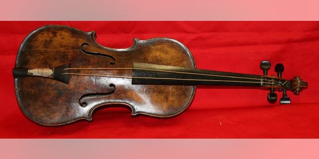 This undated photo provided by Henry Aldridge shows the violin that was played by the bandmaster of the Titanic as the oceanliner sank, Devizes, England.