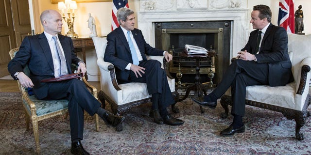 March 14, 2014: Britain's Prime Minister David Cameron, right, and Foreign Secretary William Hague, left, meet with US Secretary of State John Kerry in Downing Street, central London. (AP Photo/Brendan Smialowski, Pool)