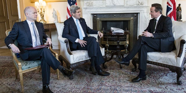 March 14, 2014: Britain's Prime Minister David Cameron, right, and Foreign Secretary William Hague, left, meet with US Secretary of State John Kerry in Downing Street, central London. (AP Photo/Brendan Smialowski, Pool)