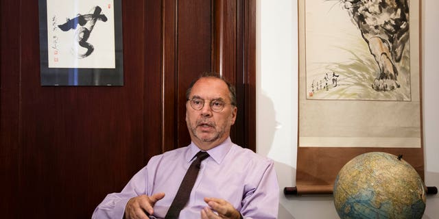 Oct. 17, 2014 - Dr. Peter Piot, the co-discoverer of the Ebola virus, speaks with The AP at his office at the London School of Hygiene and Tropical Medicine. Piot questioned why it took the World Health Organization 5 months and 1,000 deaths before the agency declared Ebola an international health emergency in August.